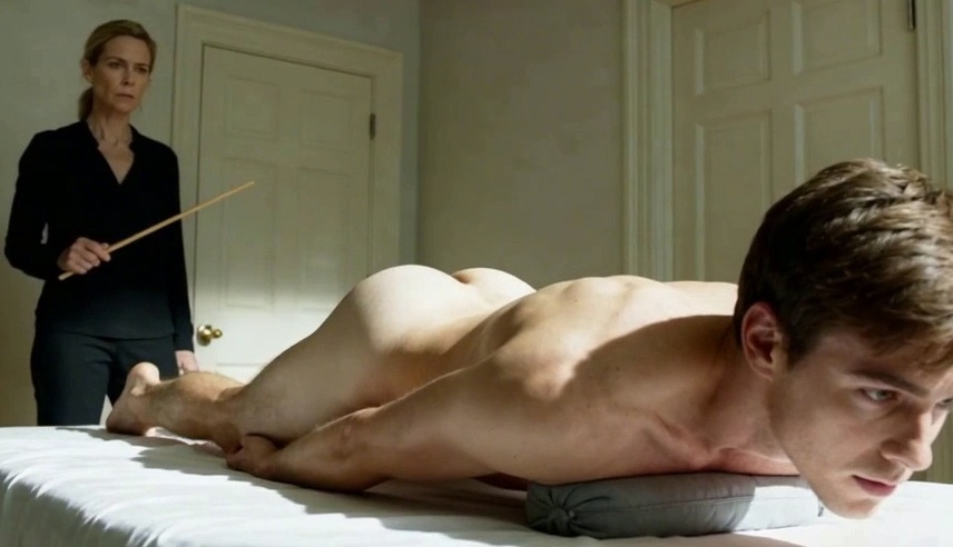 WOMAN SPANKING MAN. BARE ASS. CANING